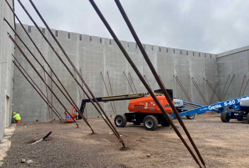 The precast panels have been set and braced. Next step is to finish caulking the seams and to installed the roof joists.