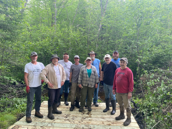 Hard working volunteers still smiling
