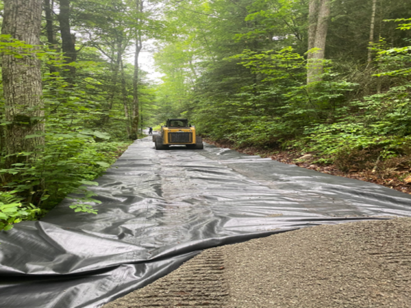 Laying the trail fabric underlayment
