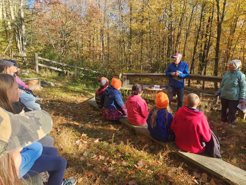 Students listing to nature discussion