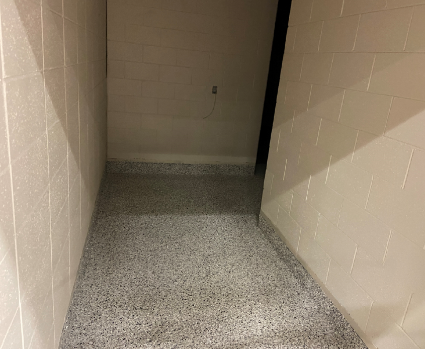 The epoxy flooring and cove base have been installed in the middle school locker rooms.