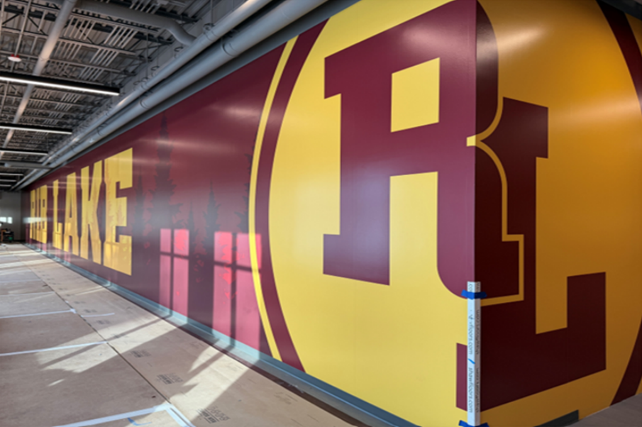 The Rib Lake vinyl graphic has been installed in the long corridor