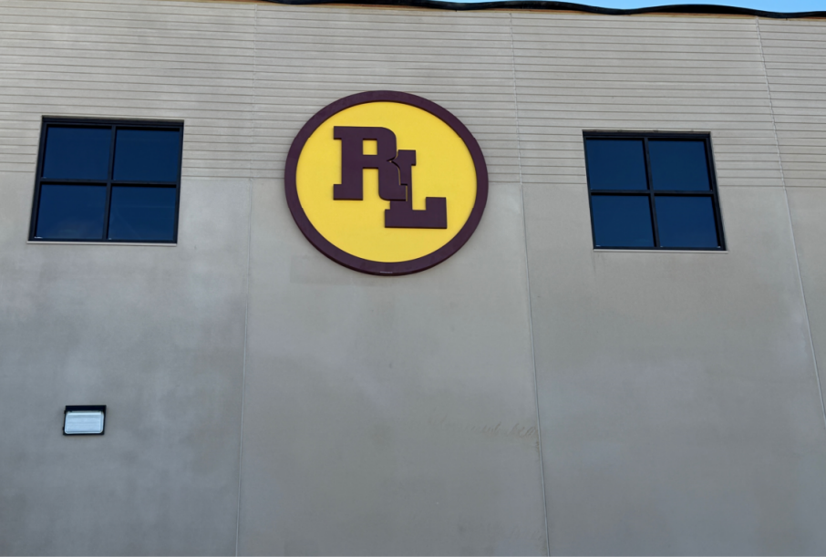 The exterior signage on the gymnasium has been installed.
