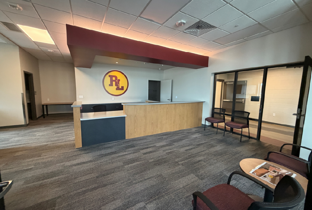 The completed reception desk is ready for the staff to move in.