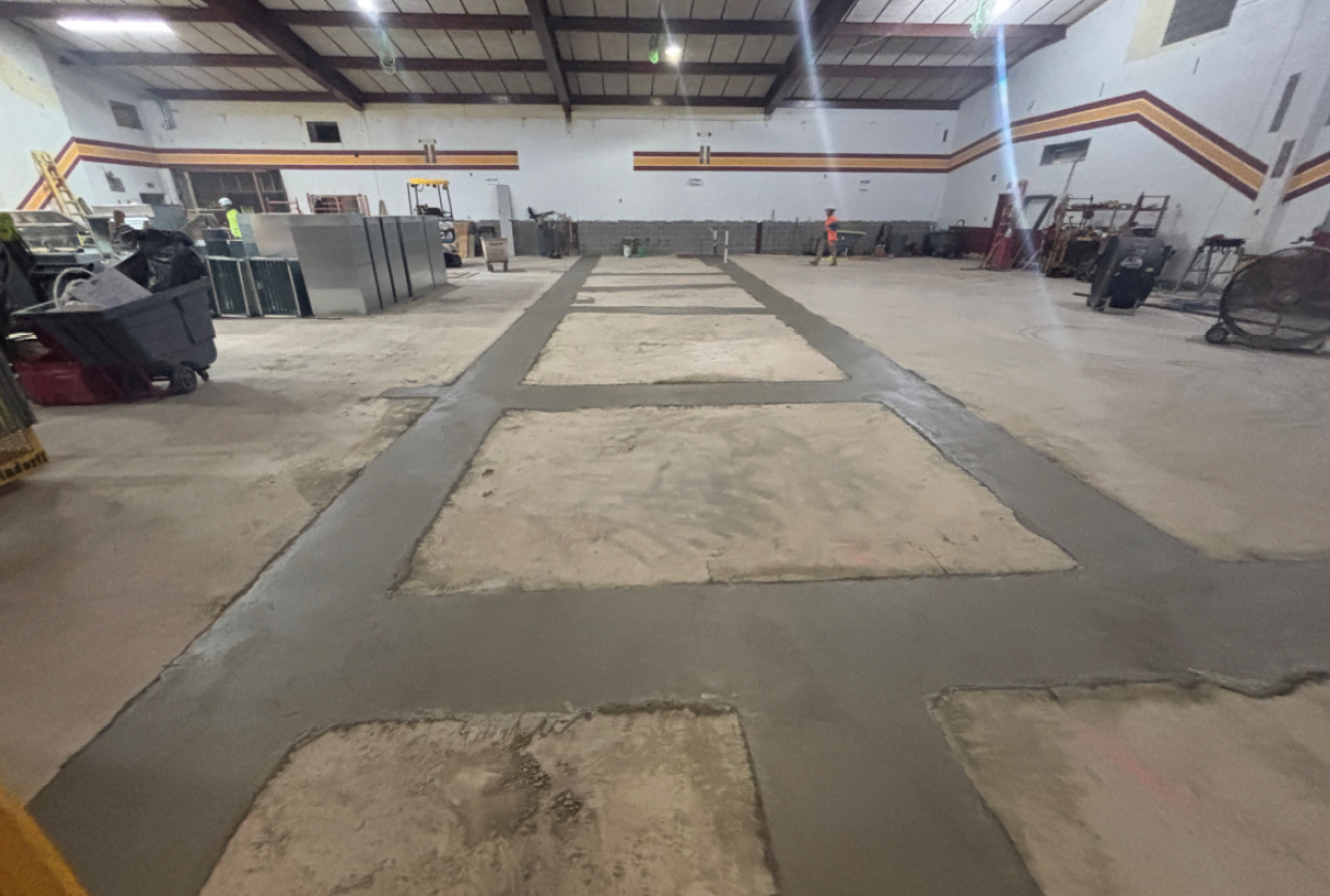 The thickened concrete footings have been poured back to get ready for masonry walls