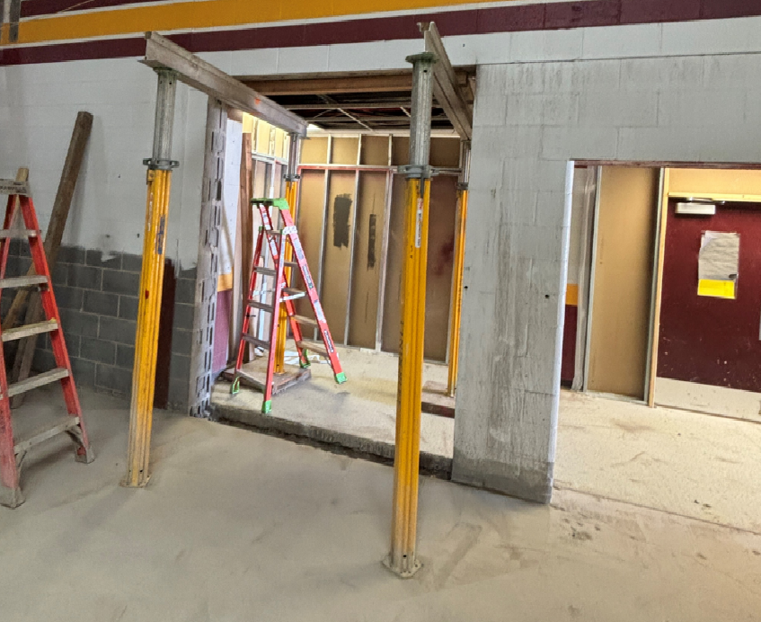 The new door openings have been cut and have been prepped for new overhead lintels.