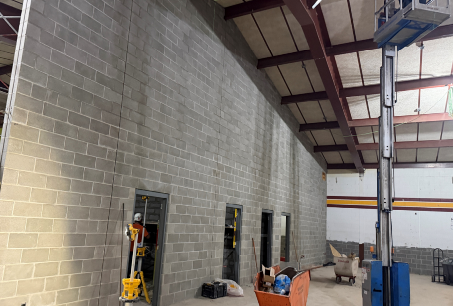 The wall separating the Band Room from the practice rooms has been constructed.